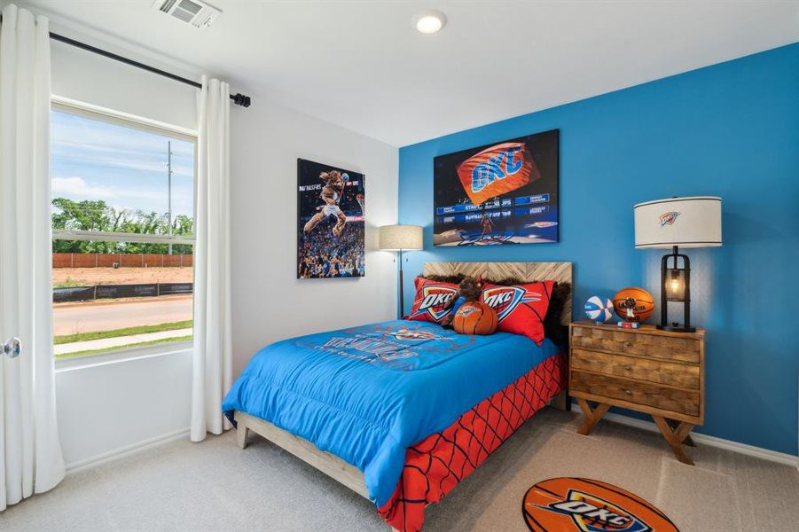 Bedroom featuring carpet floors