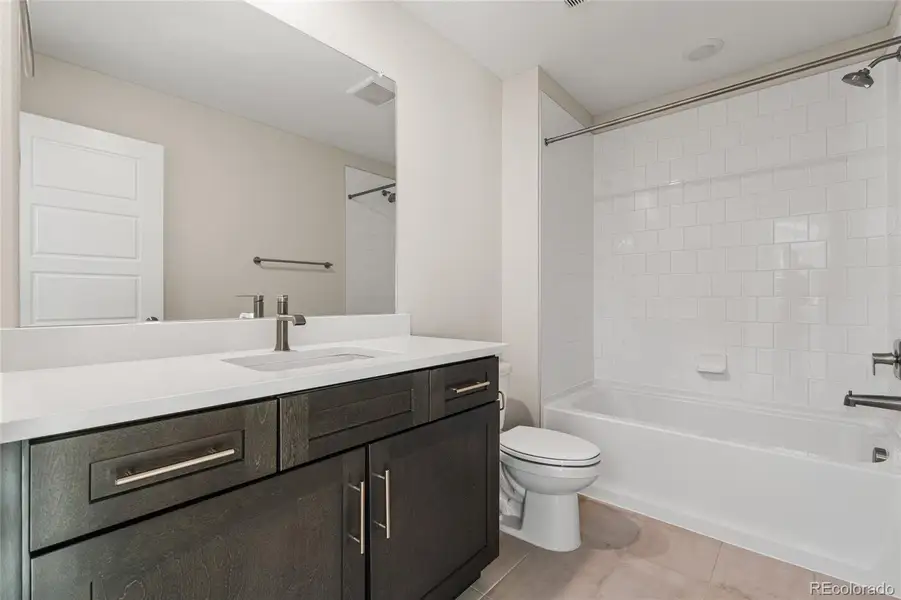 Furnished interior view inside a new home in Barefoot Village, Firestone (Image 9).