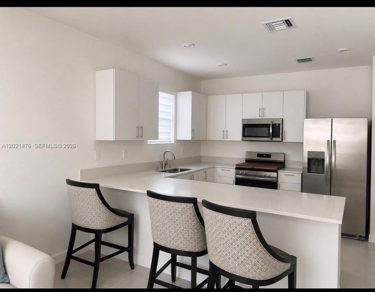 Furnished interior view inside a new home in , Miami (Image 3).