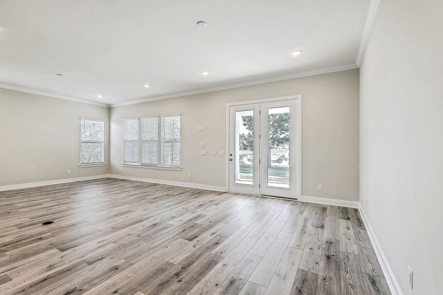 Spacious, unfurnished interior of a new home in K. Hovnanian's® Four Seasons at Lakes of Cane Bay, Summerville (Image 14).