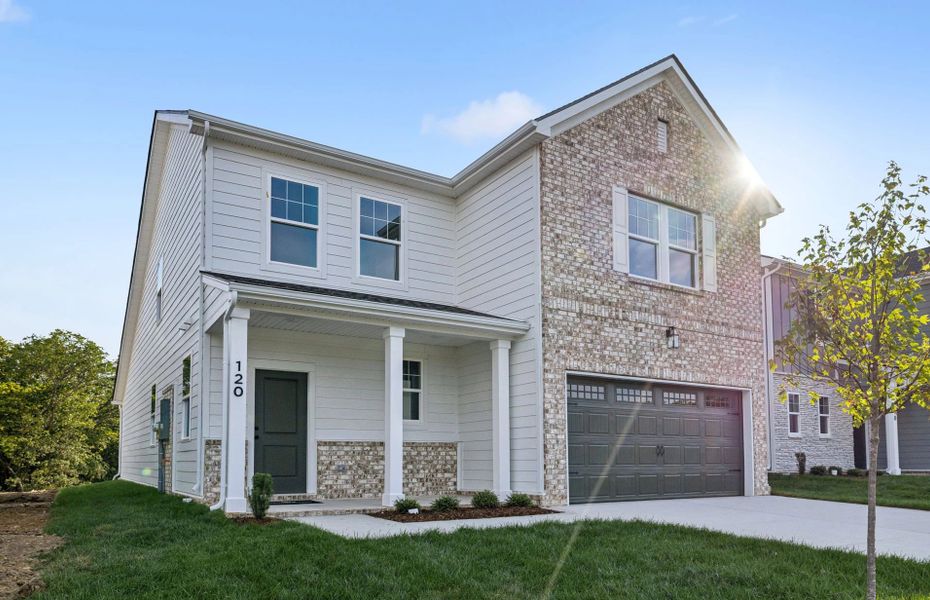 Front exterior of a new home in Ascent at Arbor Ridge, La Vergne, TN, highlighting curb appeal (Image 2).