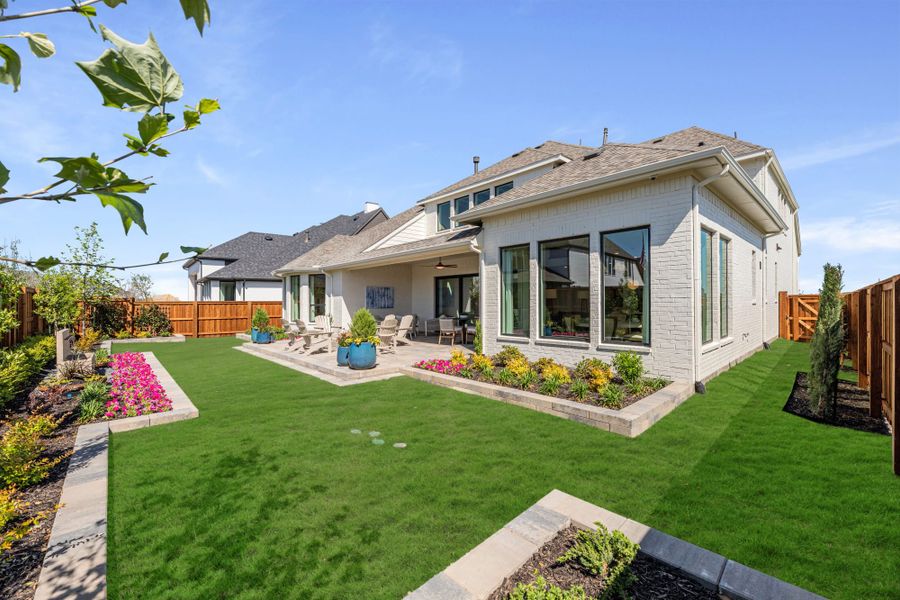 Representative exterior details of a home built from the 6051 by Tradition Homes in StarView, Prosper (Image 26).