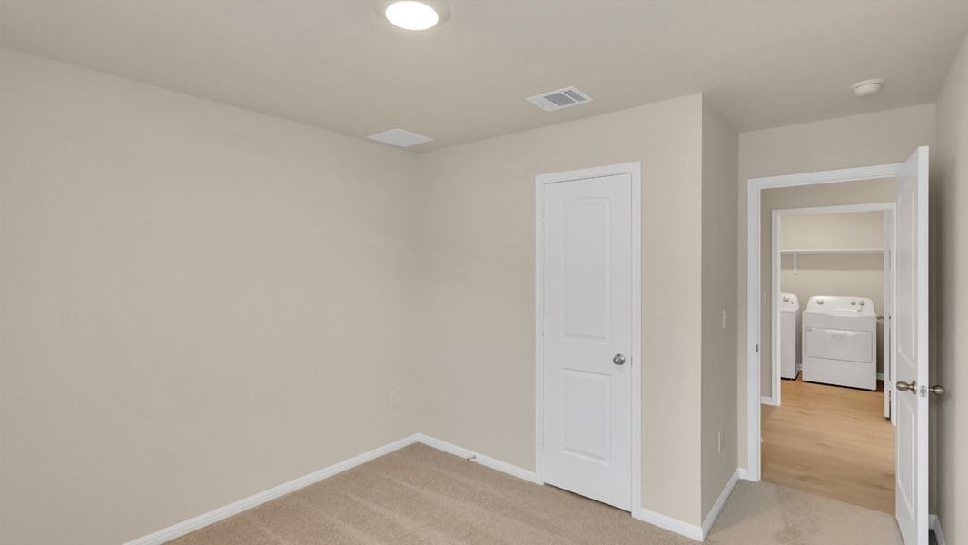 Spacious, unfurnished interior of a new home in Bar W Ranch, Leander (Image 15).