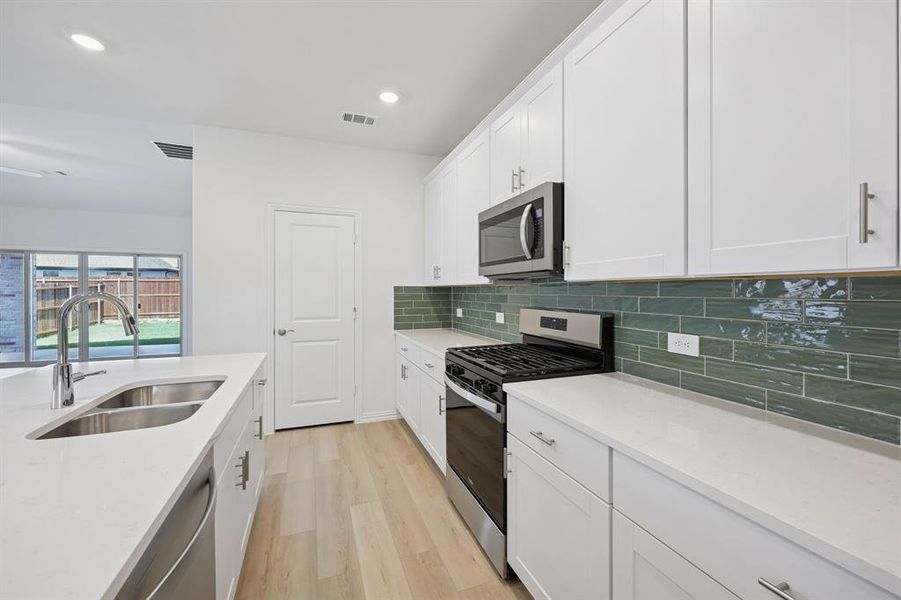 Photo is not of the actual home, but is an inspirational photo of builder’s model home and may depict options, furnishings, and/or decorator features that are not included.