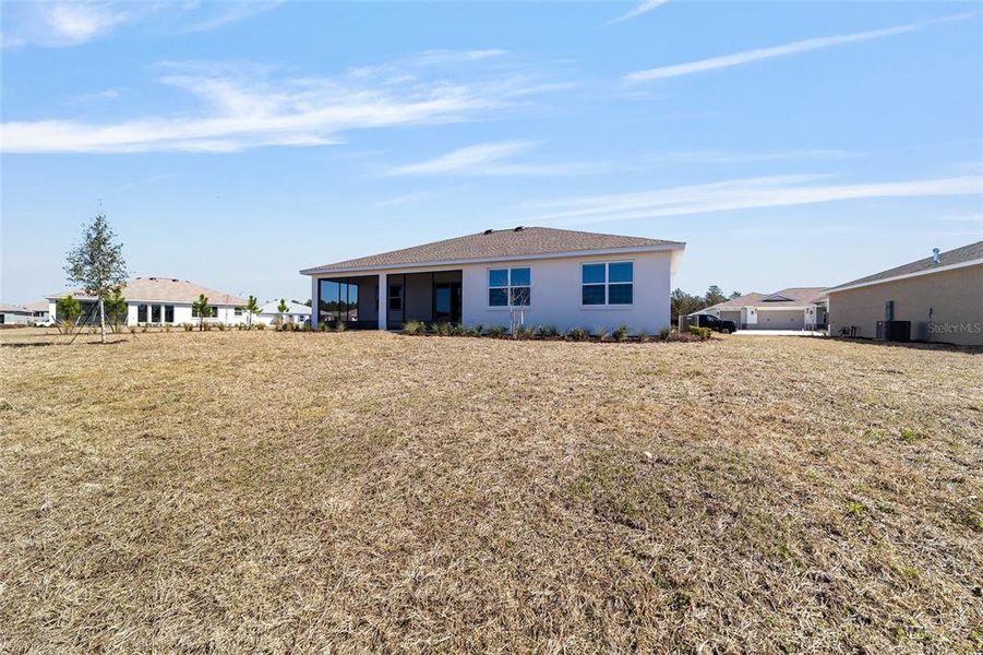 Exterior details and patio area of a home in On Top of the World Communities, Ocala (Image 4).