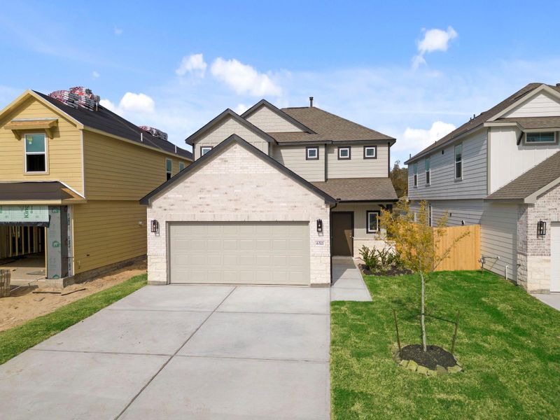 Front exterior of a new home in Cypresswood Landing, Humble, TX, highlighting curb appeal (Image 2). Front exterior of a new home in Cypresswood Landing, Humble, TX, highlighting curb appeal (Image 2).