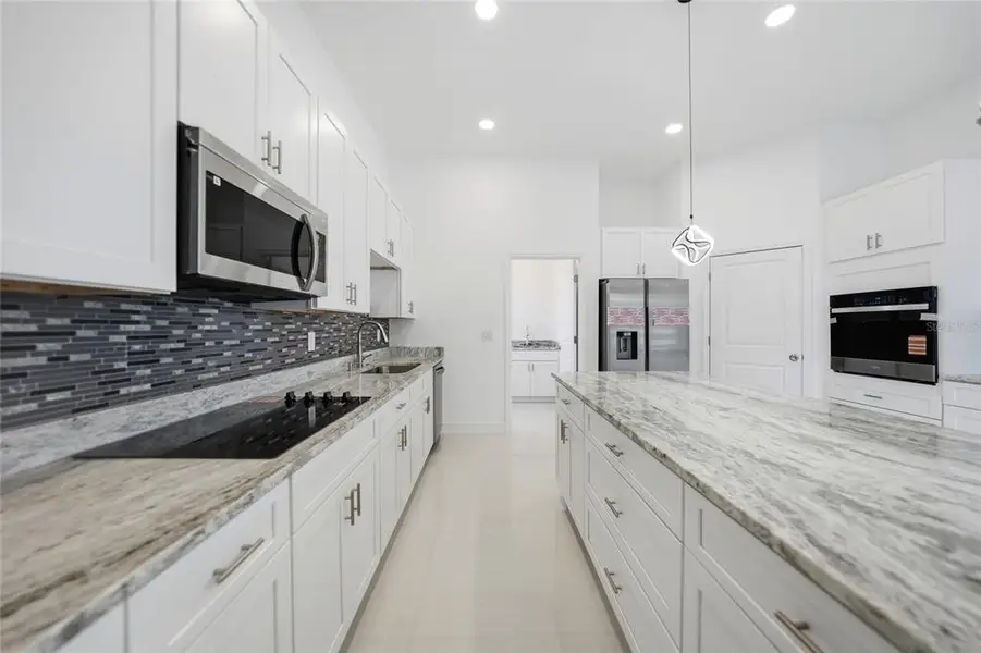 Furnished interior view inside a new home in , Port Charlotte (Image 17).