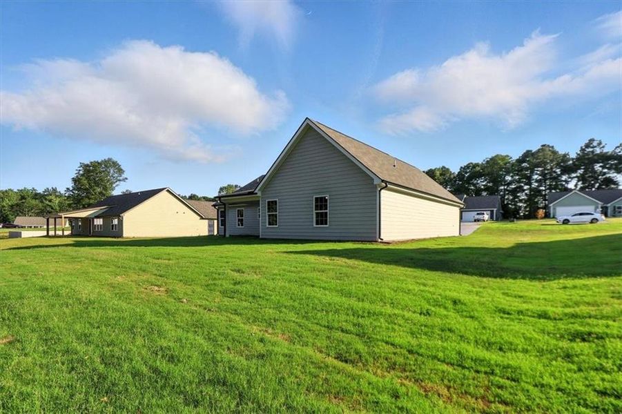 Front exterior of a new home in , Hartwell, GA, highlighting curb appeal (Image 14).