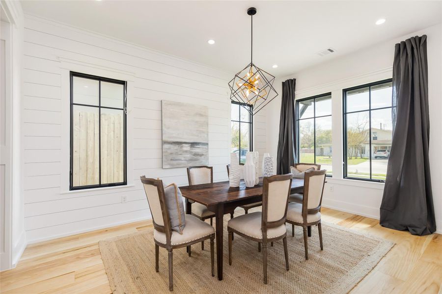 Recent construction by builder.  Shiplap accent wall