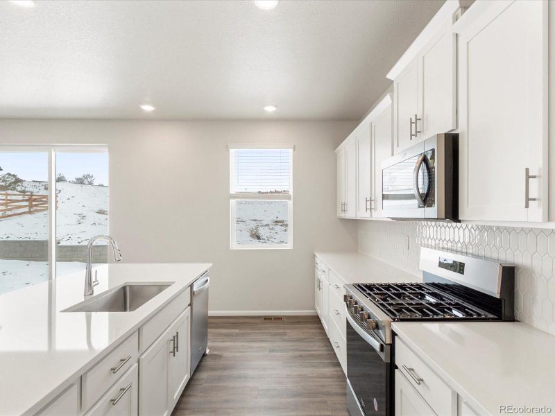 Furnished interior view inside a new home in Poudre Heights: The Alpine Collection, Windsor (Image 13).
