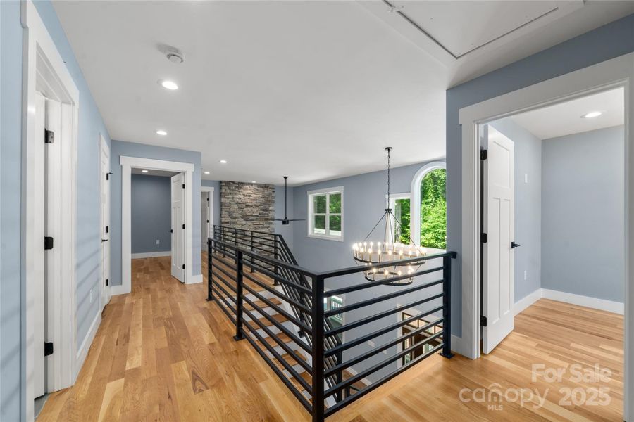 Upper level hall overlooking great room.