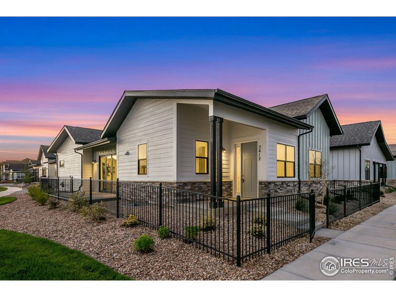 Front exterior of a new home in , Fort Collins, CO, highlighting curb appeal (Image 1). Front exterior of a new home in , Fort Collins, CO, highlighting curb appeal (Image 1).
