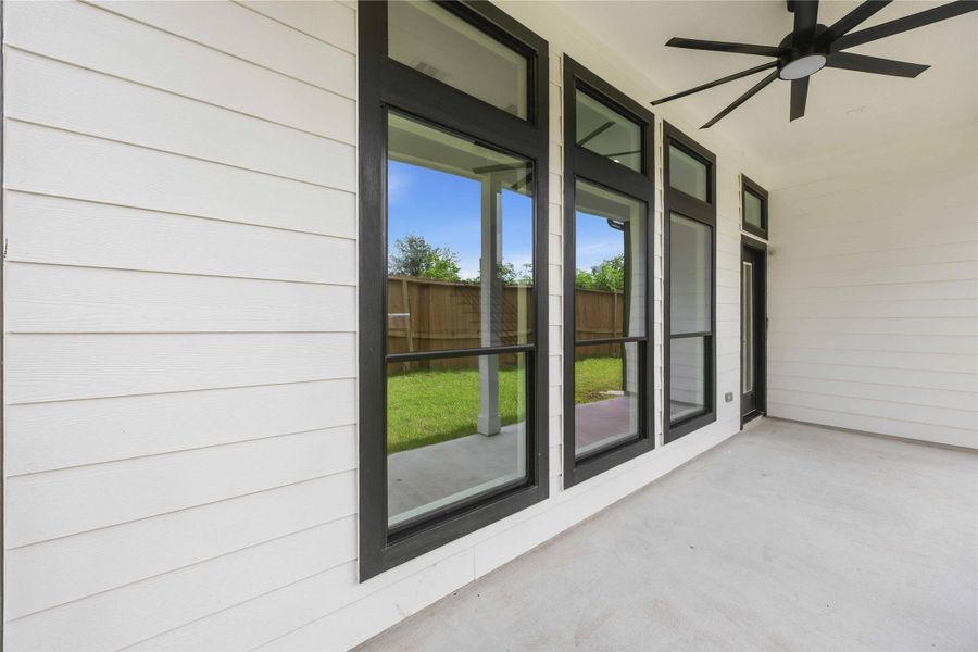 Exterior details and patio area of a home in , Houston (Image 4). Exterior details and patio area of a home in , Houston (Image 4).