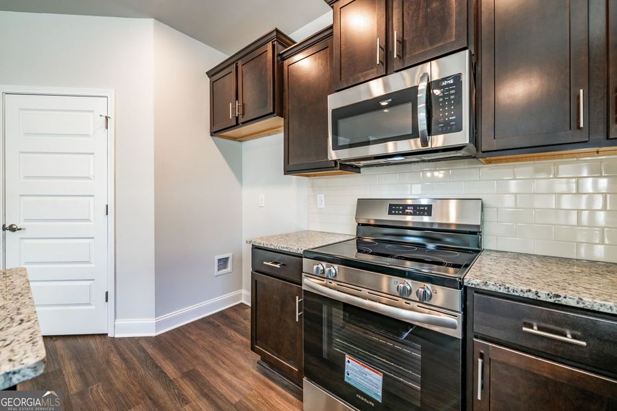 Furnished interior view inside a new home in Carson's Walk, Macon (Image 4).