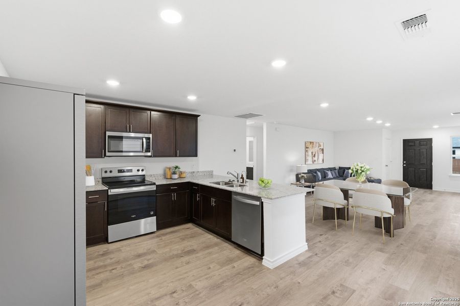 Furnished interior view inside a new home in Lily Springs, Seguin (Image 7).
