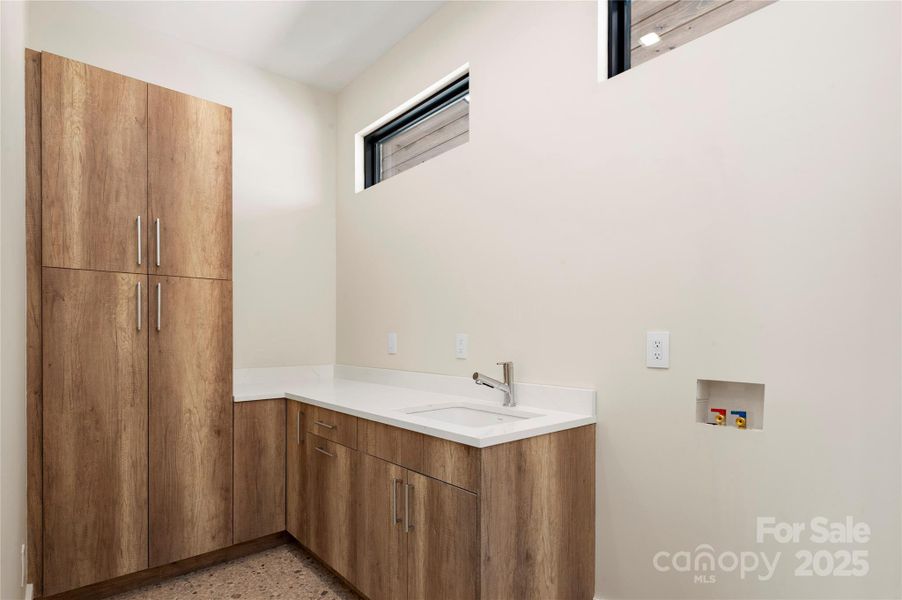 Ample storage in the laundry/utility room