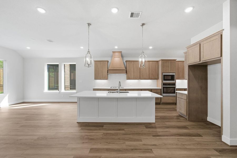 Open, inviting kitchen—perfect for entertaining guests while staying connected to the main living areas.