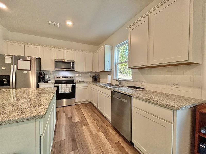 Furnished interior view inside a new home in , Gainesville (Image 43).