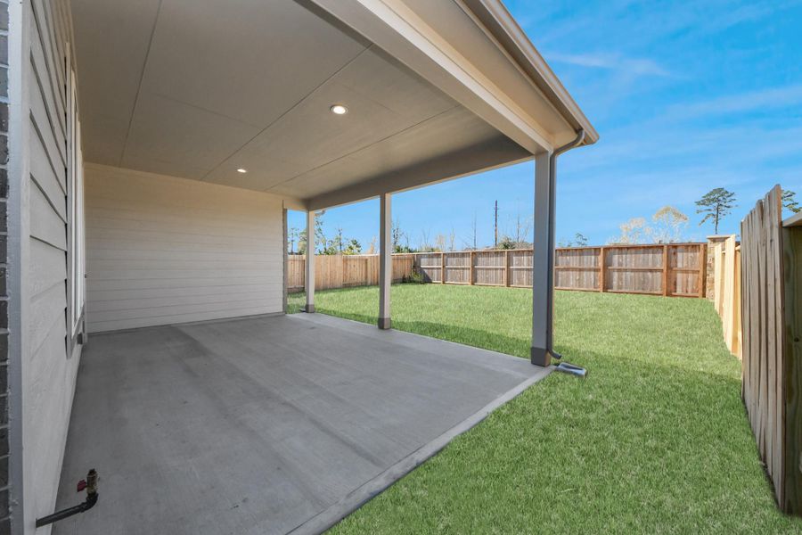 Come and see this spacious backyard with its beautiful covered patio. There is plenty of room for the kids to play and adults to relax. Perfect for your outdoor living space, patio furniture, bbq pit, and so much more. The possibilities are endless!