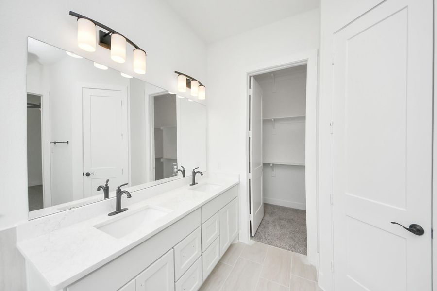 Furnished interior view inside a new home in Meridiana, Manvel (Image 14).