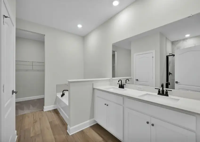 Master bathroom includes dual sinks
