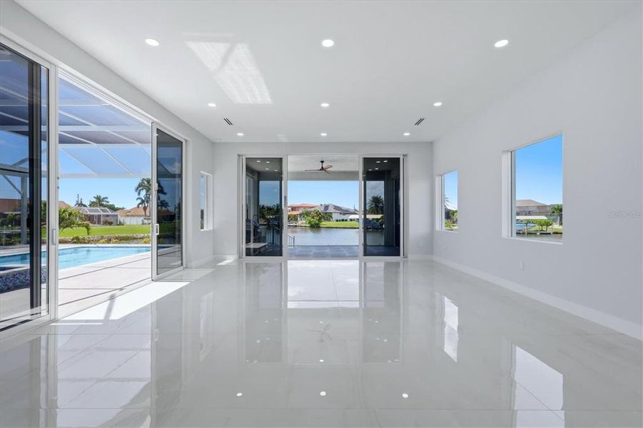 Spacious, unfurnished interior of a new home in , Port Charlotte (Image 32).