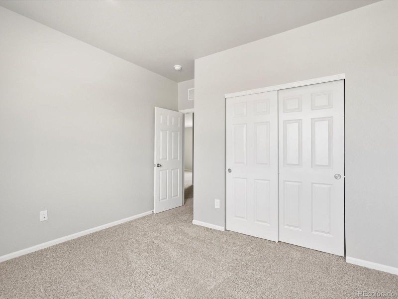 Spacious, unfurnished interior of a new home in Poudre Heights: The Alpine Collection, Windsor (Image 16).