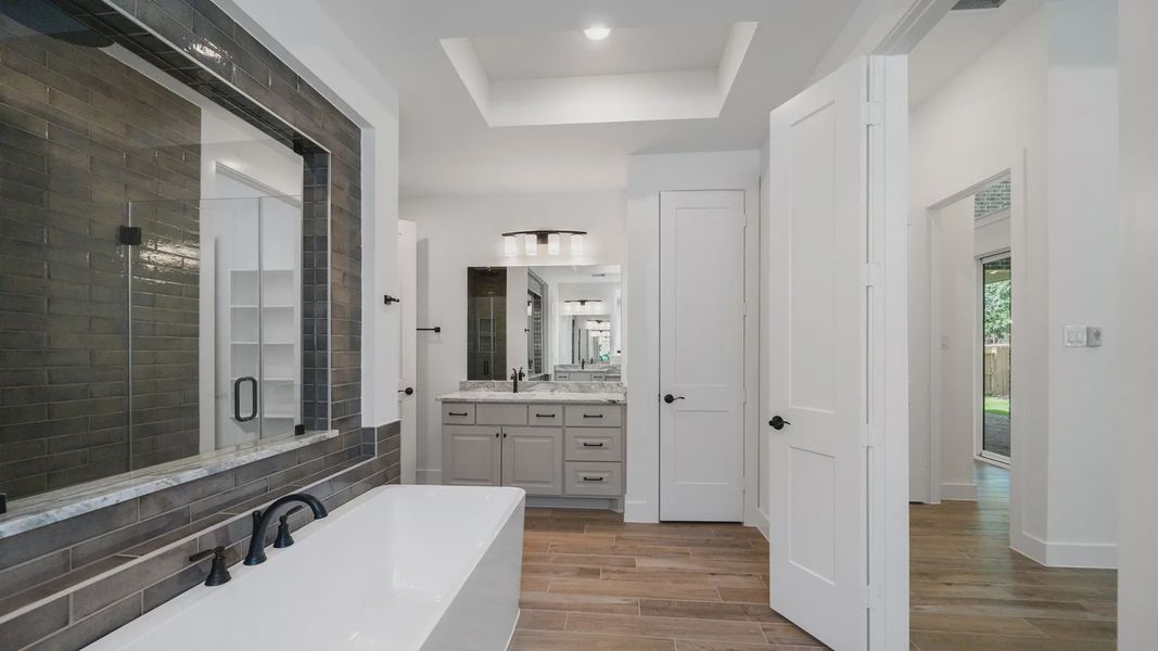 Representative furnished interior of a home built from the Waterloo by Chesmar Homes in Attwater 65's, Waller (Image 9).