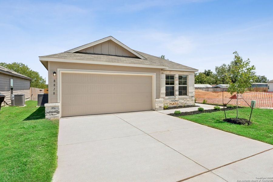 Front exterior of a new home in Cinco Lakes, San Antonio, TX, highlighting curb appeal (Image 2). Front exterior of a new home in Cinco Lakes, San Antonio, TX, highlighting curb appeal (Image 2).