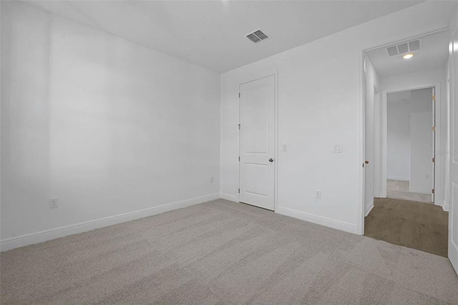 Spacious, unfurnished interior of a new home in Green Key Village, Lady Lake (Image 37).