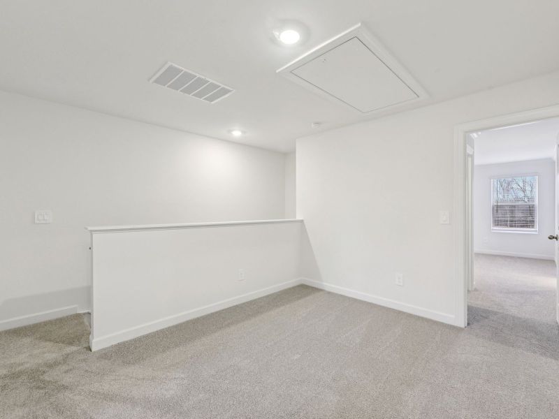 Spacious, unfurnished interior of a new home in Rocky River Towns, Charlotte (Image 12).