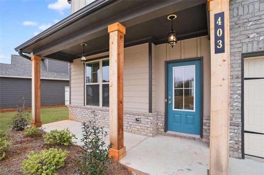 Exterior details and patio area of a home in The Fairways at Mirror Lake, Villa Rica (Image 3).