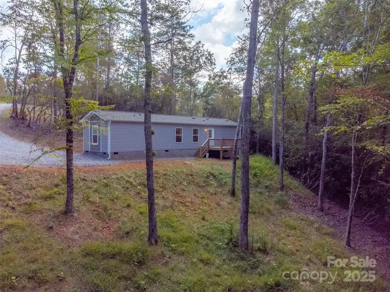 Exterior details and patio area of a home in , Hayesville (Image 23).