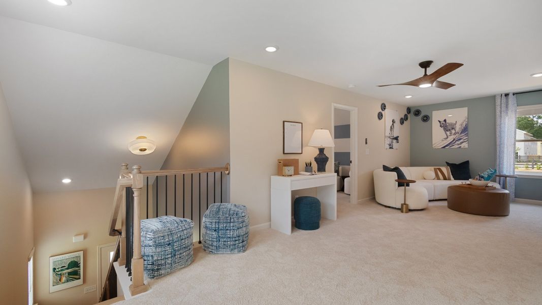 Spacious upstairs loft with plenty of light, perfect for home office or lounge.