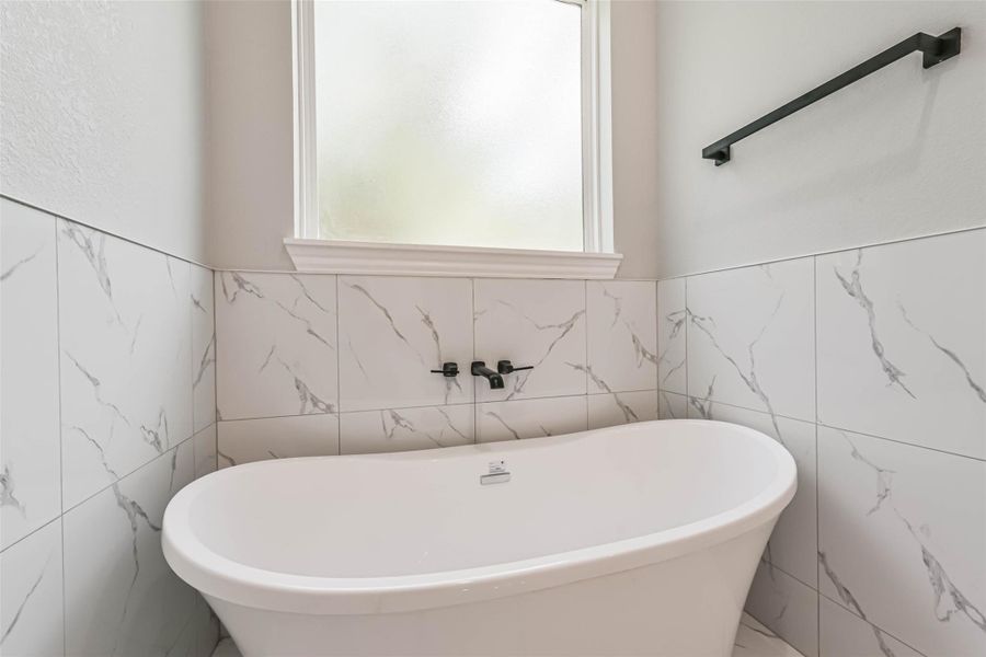 Furnished interior view inside a new home in , Conroe (Image 5).