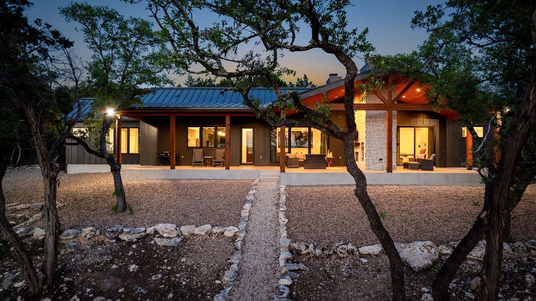 This is a TO BE BUILT custom home on 6.75 acres in Rainbow Ranch, Wimberley TX.