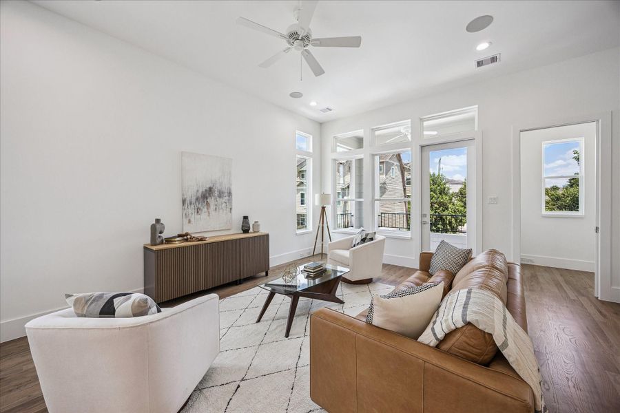 Spacious living room with seamless flow to the outdoor terrace and dining area.