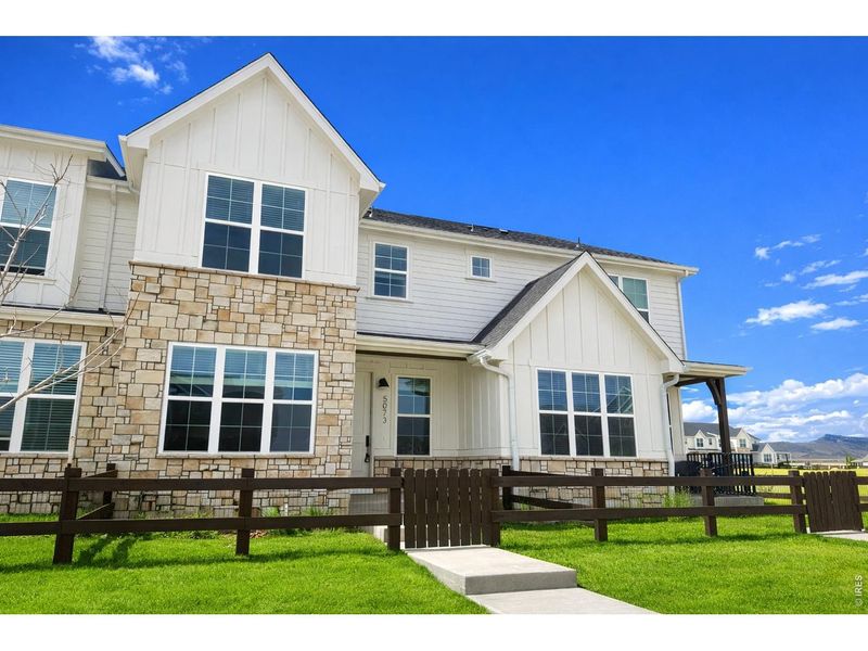 Front exterior of a new home in , Loveland, CO, highlighting curb appeal (Image 1). Front exterior of a new home in , Loveland, CO, highlighting curb appeal (Image 1).