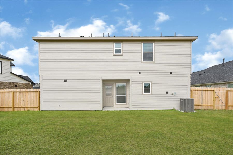 Exterior details and patio area of a home in Rollingbrook Estates, Baytown (Image 4). Exterior details and patio area of a home in Rollingbrook Estates, Baytown (Image 4).