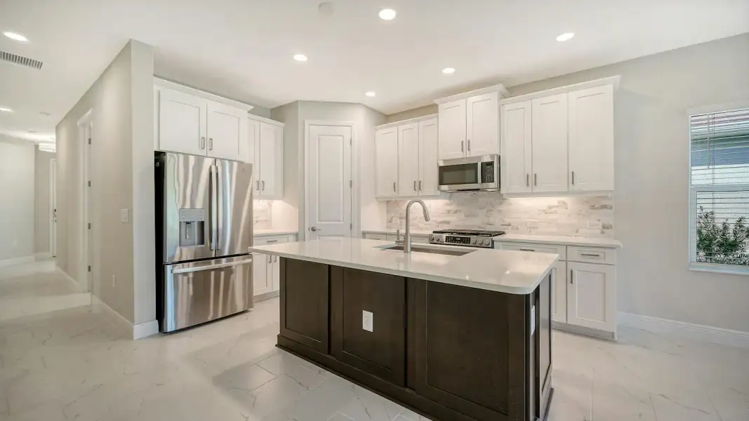 Furnished interior view inside a new home in Windward Real Estate and Homes for Sale in Sarasota, FL - Neal Communities, Sarasota (Image 11). Furnished interior view inside a new home in Windward Real Estate and Homes for Sale in Sarasota, FL - Neal Communities, Sarasota (Image 11).