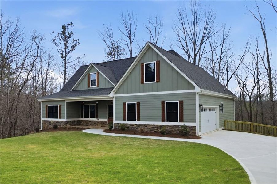 Front exterior of a new home in , Ball Ground, GA, highlighting curb appeal (Image 23).