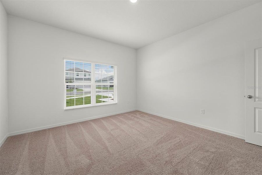 Spacious, unfurnished interior of a new home in Tula Parc, Astatula (Image 13).