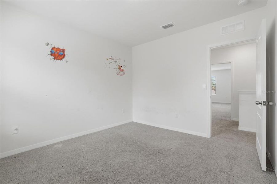 Spacious, unfurnished interior of a new home in Poinciana Enclave, Kissimmee (Image 32).