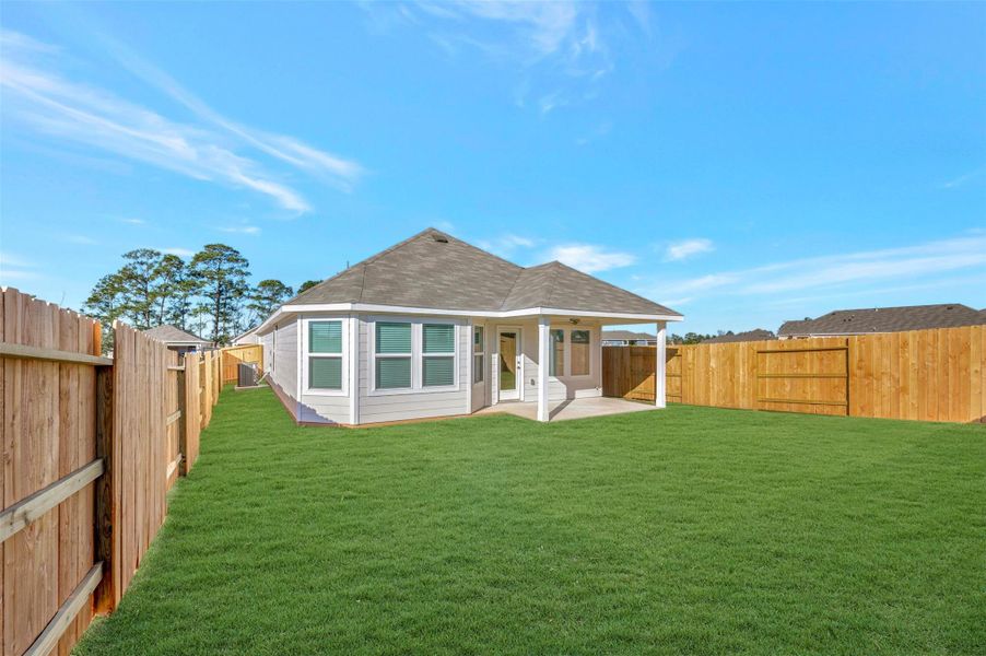 Exterior details and patio area of a home in Lone Star Landing, Montgomery (Image 19). Exterior details and patio area of a home in Lone Star Landing, Montgomery (Image 19).