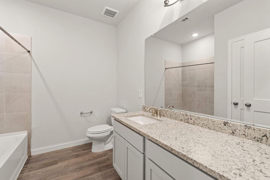 Furnished interior view inside a new home in Creekland Village at Bridgeland, Cypress (Image 6). Furnished interior view inside a new home in Creekland Village at Bridgeland, Cypress (Image 6).