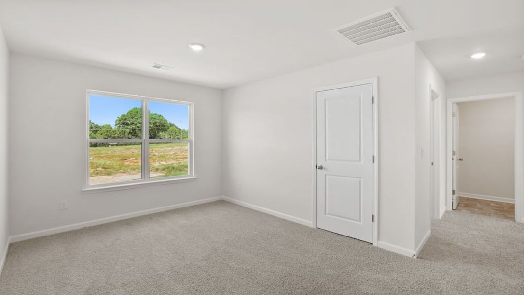 Spacious, unfurnished interior of a new home in Durbin Meadows Traditions, Fountain Inn (Image 30).