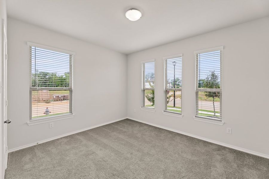 Representative exterior photo of a completed home built from the Phoenix by Impression Homes in Terra Vella, Haslet, TX (Image 19).