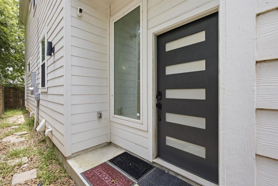Exterior details and patio area of a home in , Houston (Image 4). Exterior details and patio area of a home in , Houston (Image 4).