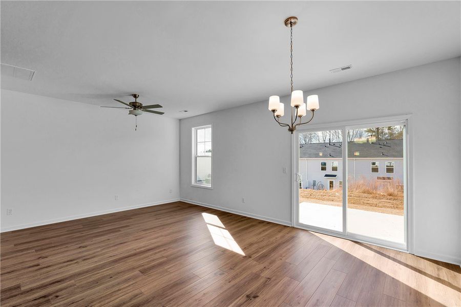 This bright space features gleaming wood floors an This bright space features gleaming wood floors an