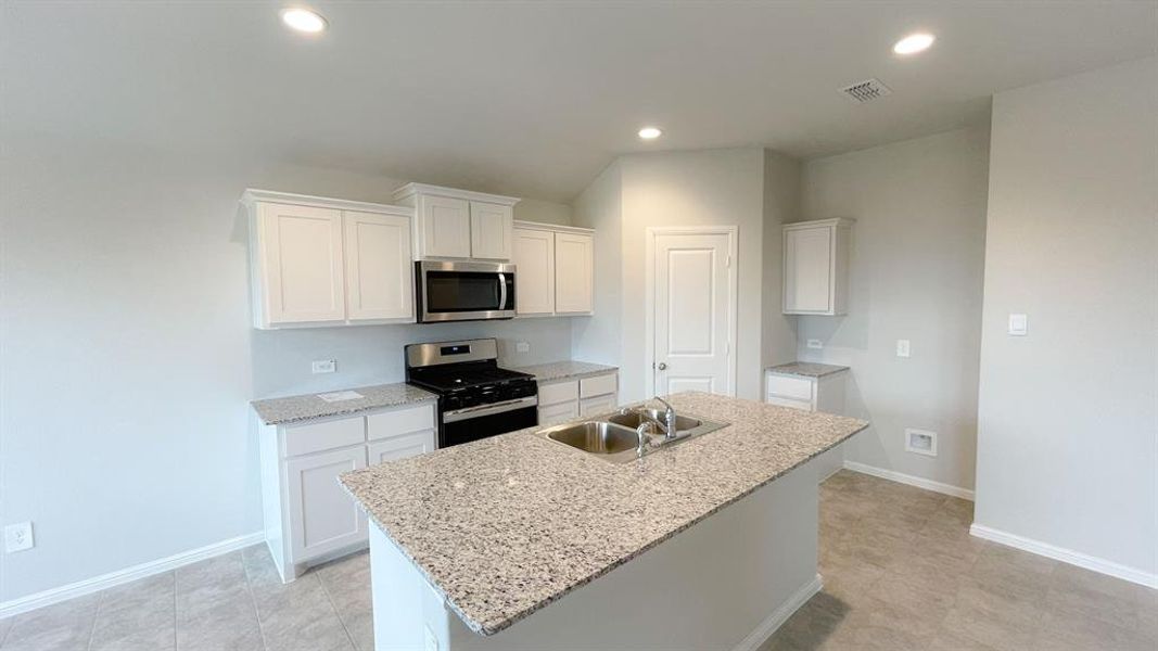 Kitchen - All Home and community information, including pricing, included features, terms, availability and amenities, are subject to change at any time without notice or obligation. All Drawings, pictures, photographs, video, square footages, floor plans, elevations, features, colors and sizes are approximate for illustration purposes only and will vary from the homes as built.